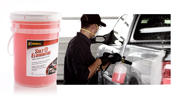 Man applying salt eliminator to a truck - representing commercial cleaning products
