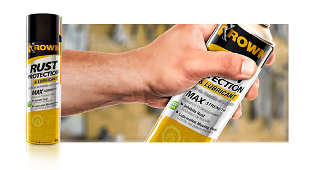 Hand holding rust protection can representing Rust Protection & Lubricants